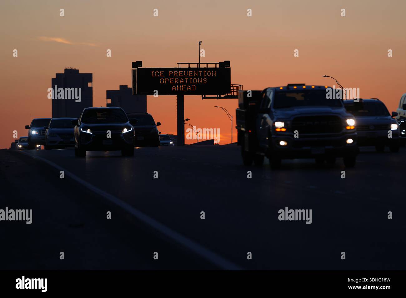 A sign visible from the eastbound lanes of Highway 121 warns of road ...