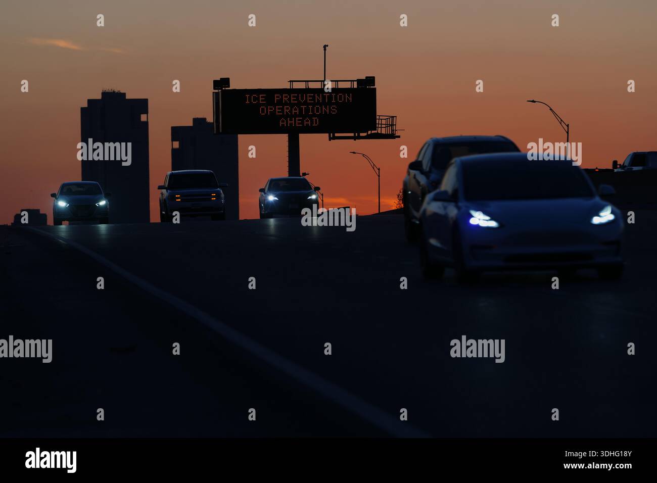 A sign visible from the eastbound lanes of Highway 121 warns of road ...
