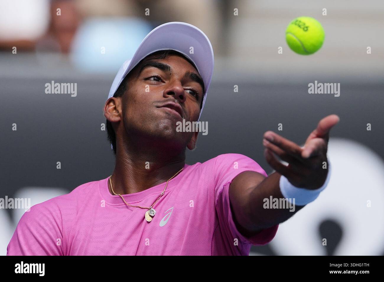 Nishesh Basavareddy of the U.S. serves to Karen Khachanov of Russia ...