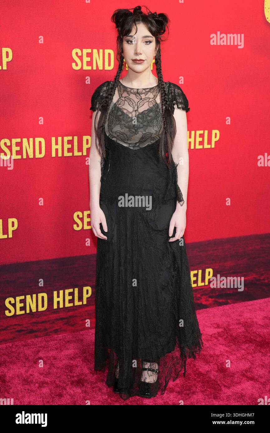 Emma Raimi arrives at the premiere of 