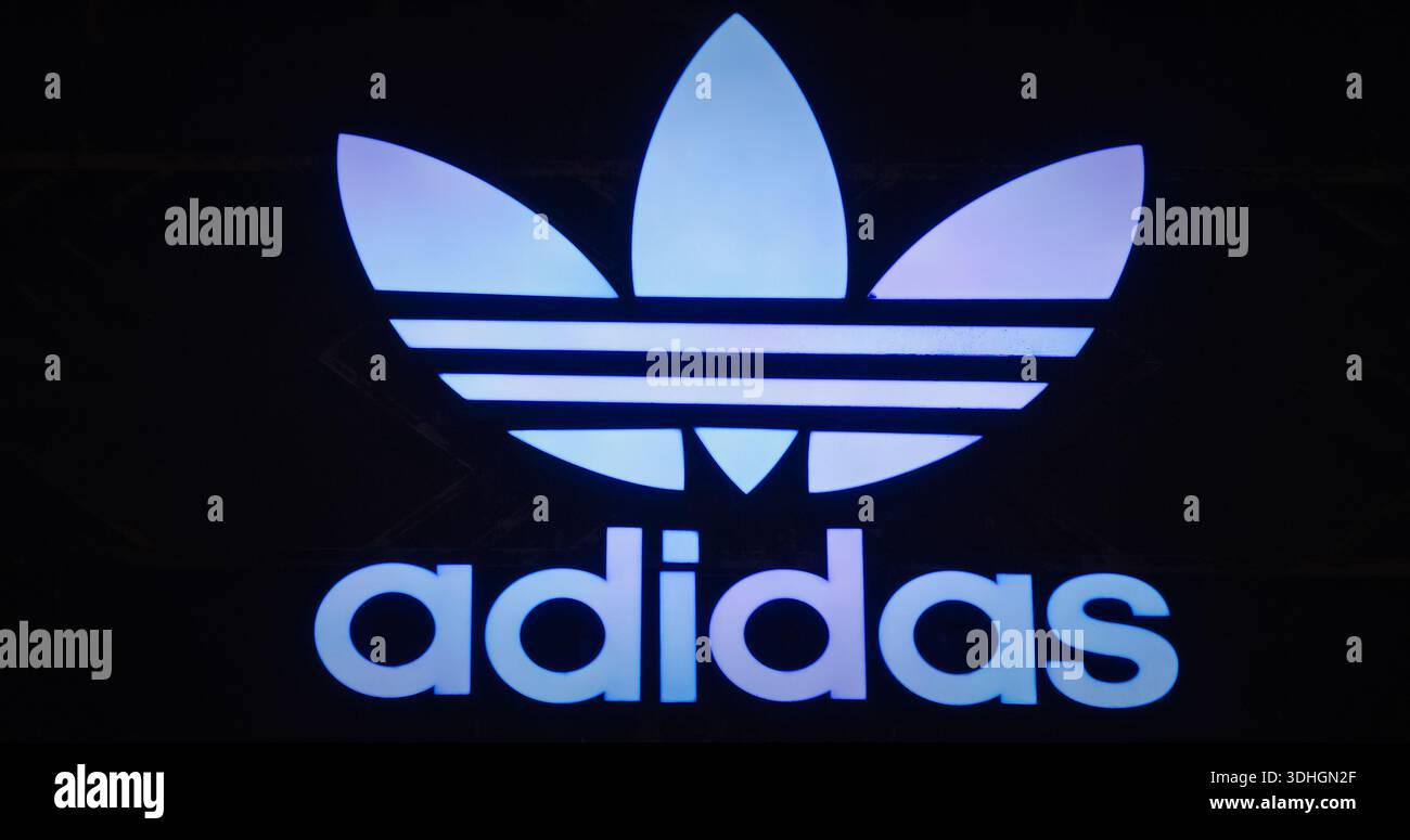 Shanghai, China. Adidas Sign. Adidas Brand Logo Of German Multinational  Corporation That Manufactures Sports Shoes, Clothing And Accessories. Adidas  Stock Photo - Alamy
