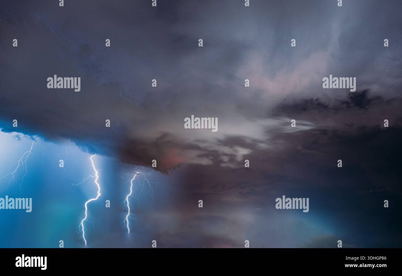 Dark stormy clouds lightning in hi-res stock photography and images - Alamy