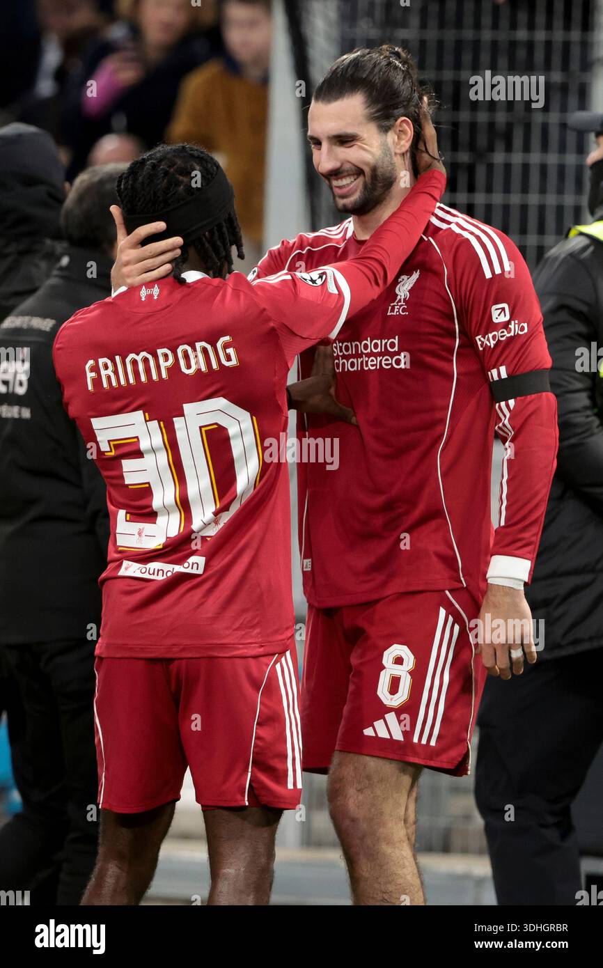 Dominik Szoboszlai #8 of Liverpool celebrates in front of the Kop