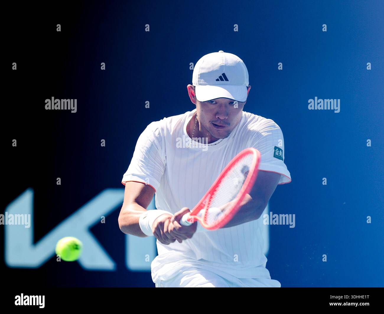 Melbourne, Australia. 22nd Jan, 2026. Wu Yibing hits a return during the men's singles 2nd round match between Wu Yibing of China and Eliot Spizzirri of the United States at the Australian Open tennis tournament in Melbourne, Australia, Jan. 22, 2026. Credit: Ma Ping/Xinhua/Alamy Live News Stock Photo
