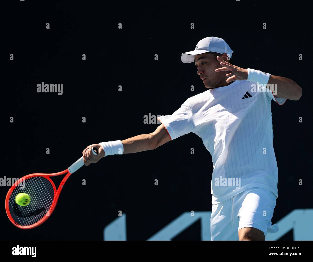 Melbourne, Australia. 22nd Jan, 2026. Wu Yibing hits a return during the men's singles 2nd round match between Wu Yibing of China and Eliot Spizzirri of the United States at the Australian Open tennis tournament in Melbourne, Australia, Jan. 22, 2026. Credit: Ma Ping/Xinhua/Alamy Live News Stock Photo