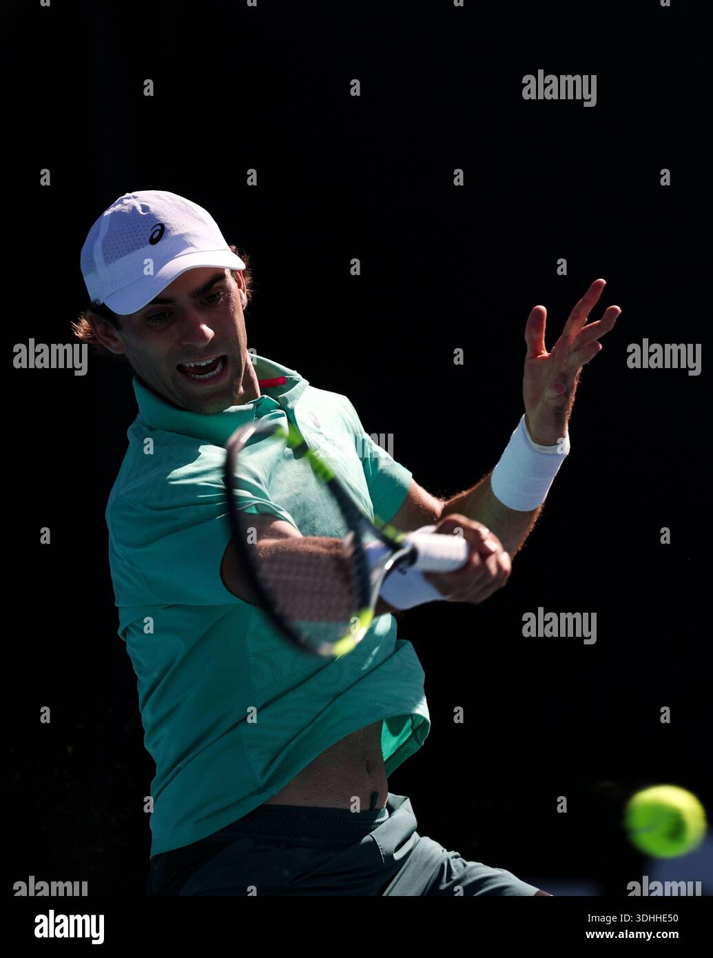Melbourne, Australia. 22nd Jan, 2026. Eliot Spizzirri hits a return during the men's singles 2nd round match between Wu Yibing of China and Eliot Spizzirri of the United States at the Australian Open tennis tournament in Melbourne, Australia, Jan. 22, 2026. Credit: Ma Ping/Xinhua/Alamy Live News Stock Photo