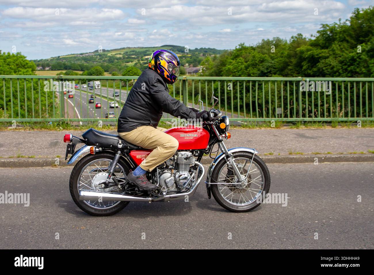 1970s Honda Super Sport motorcycle, Honda CB400F motorcyclist, air 