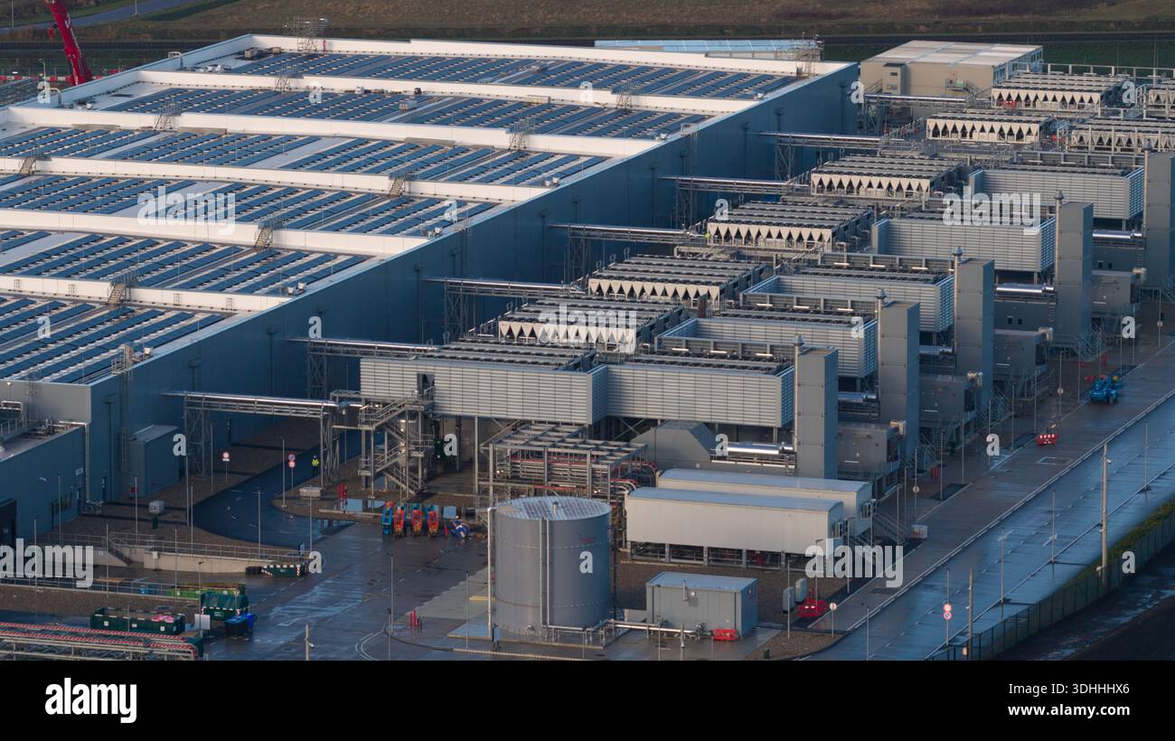 Data center building featuring solar panels and advanced cooling systems Stock Photo