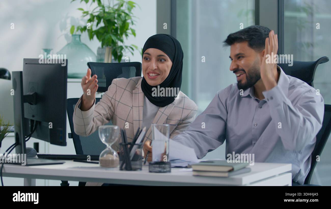 Two muslim business team in office working Islamic group Indian co ...