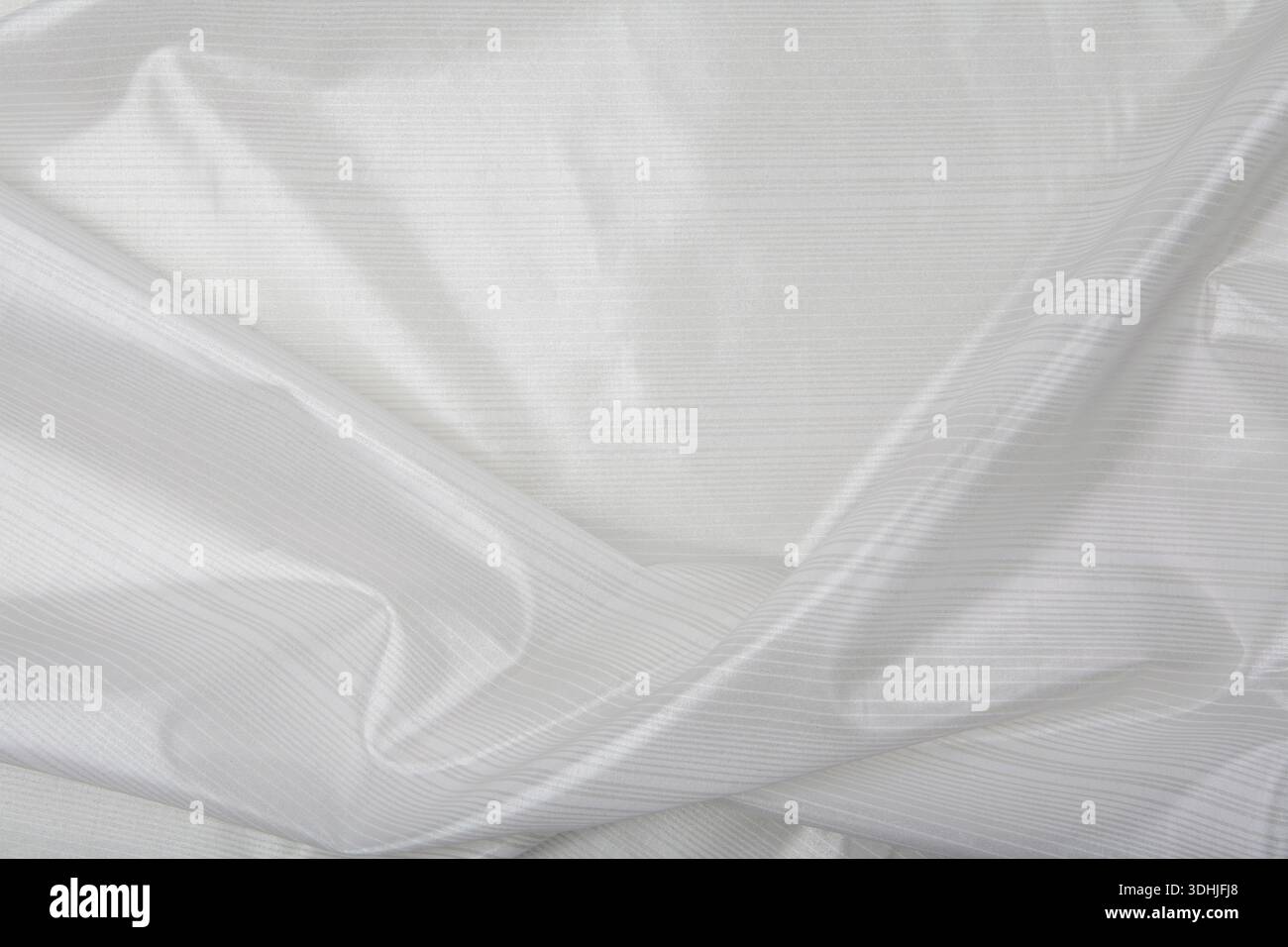 Shiny white striped fabric Stock Photo