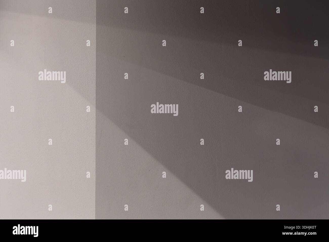 Shadows on wall for use as a background texture Stock Photo