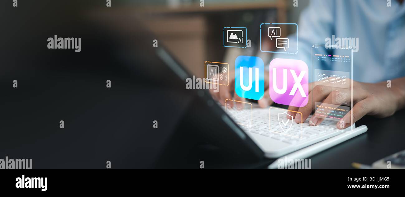 Web designer hands typing on keyboard developing application. UI UX interface design concept with virtual wireframe, AI technology icons, and coding e Stock Photo