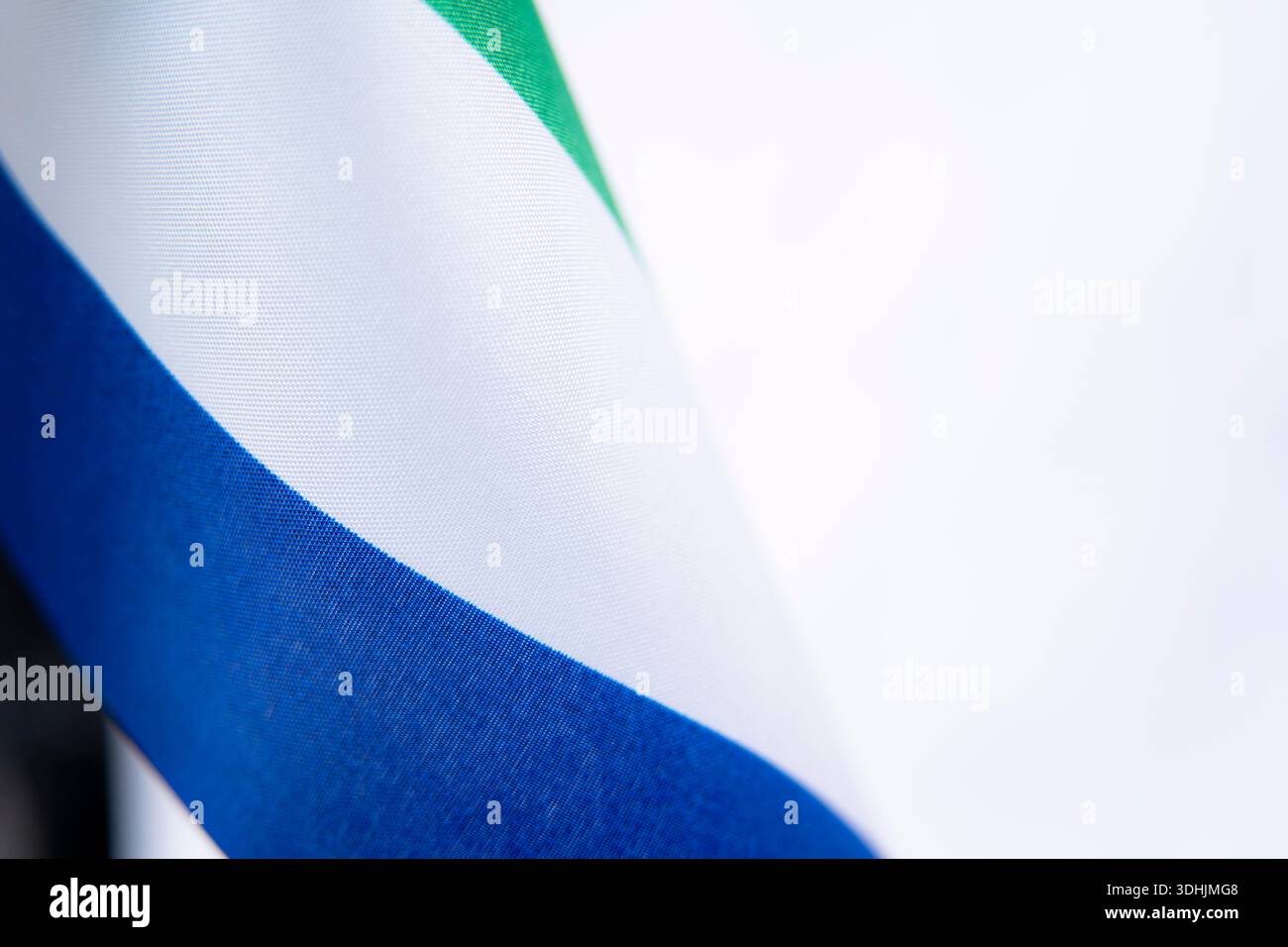 Close Up Blue White Green Flag Fabric Stock Photo