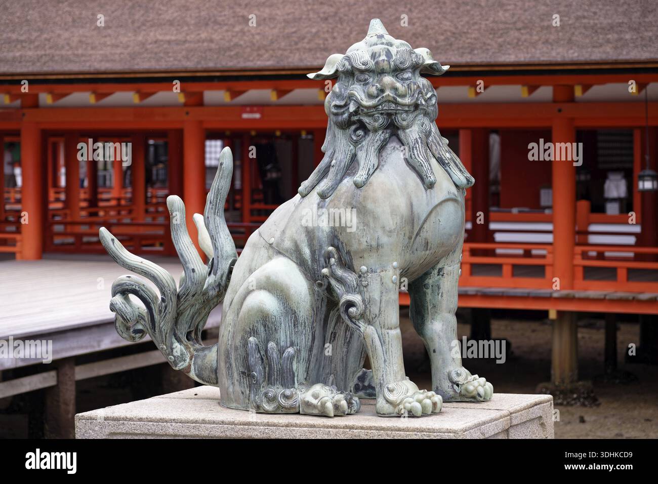 Komainu at itsukushima shrine hi-res stock photography and images