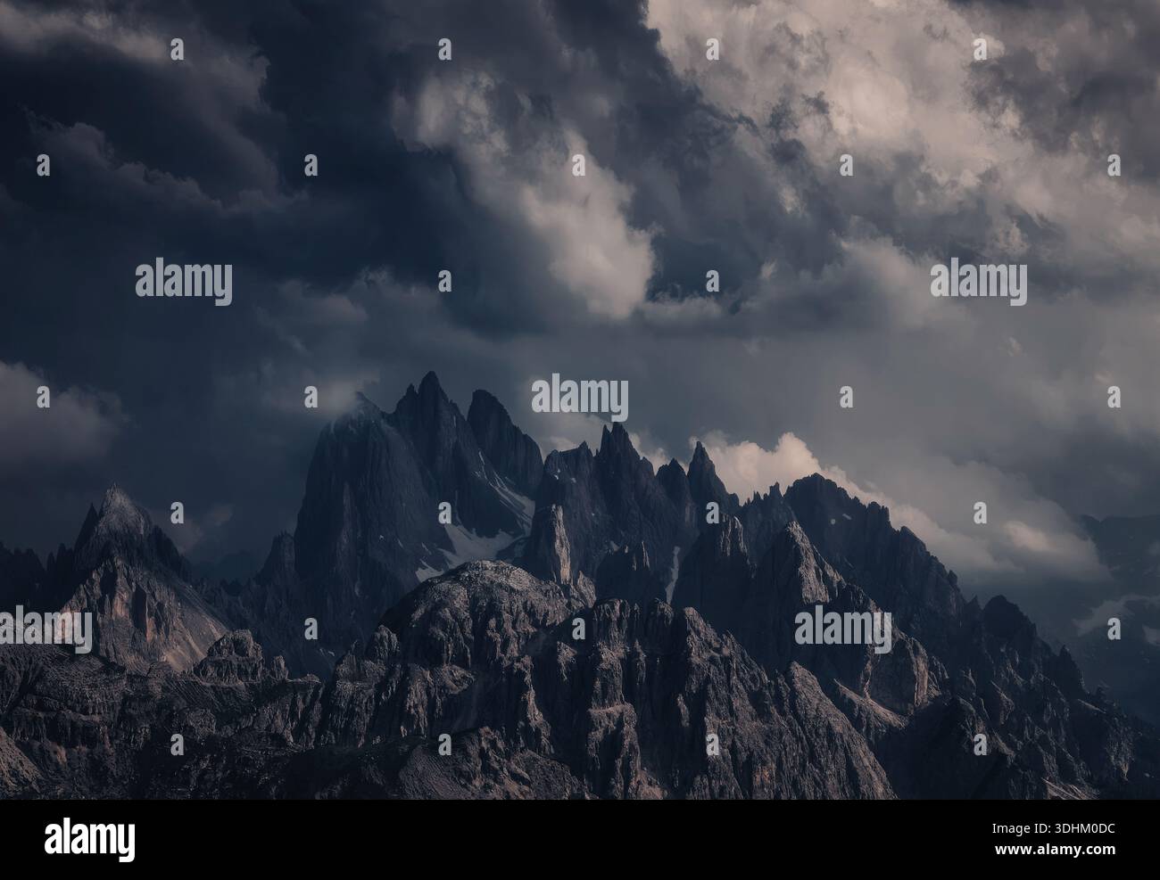 A breathtaking view of a rugged mountain range with sharp peaks ...