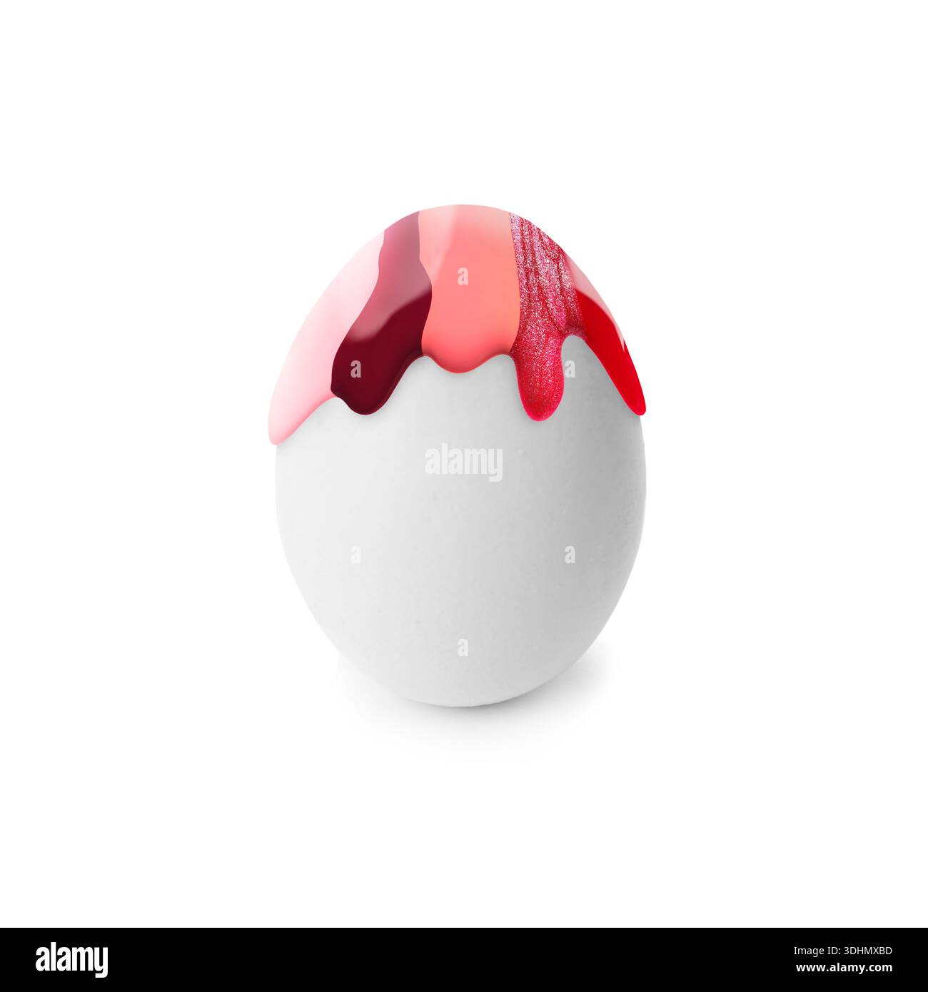 Colorful paint dripping down egg on white background. Easter celebration Stock Photo