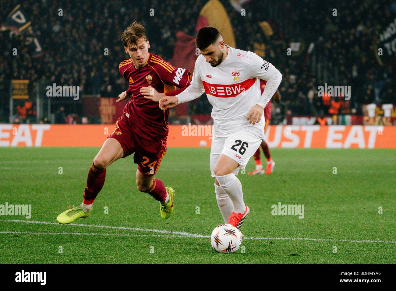 Rom Jan Tackle Jan Ziolkowski (AS ROM, #24) and Deniz Undav (Stuttgart, #26 ...