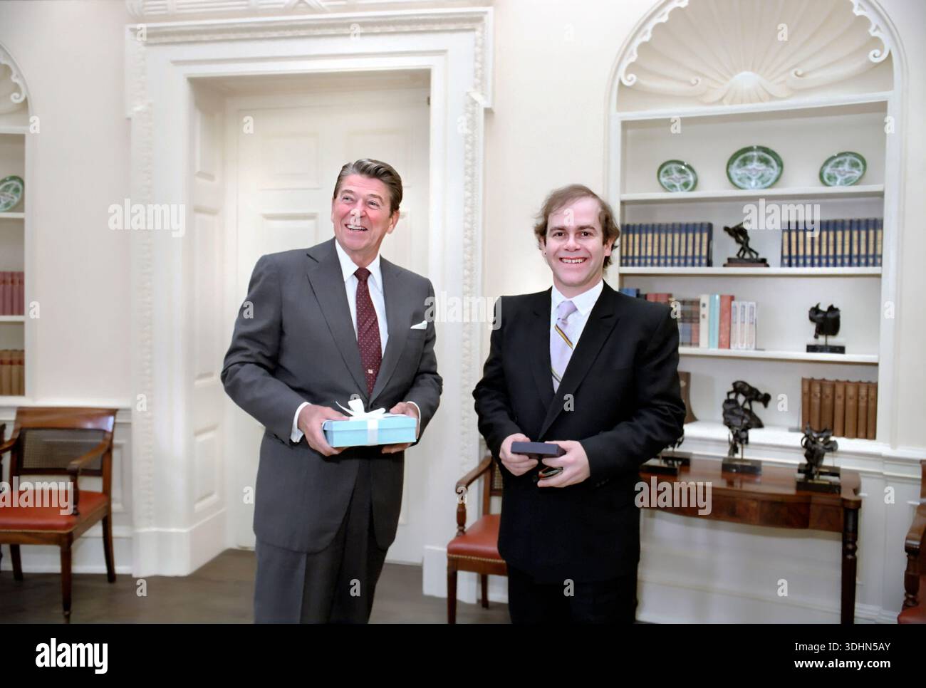 U.S. President Ronald Reagan with British musician Elton John in White ...