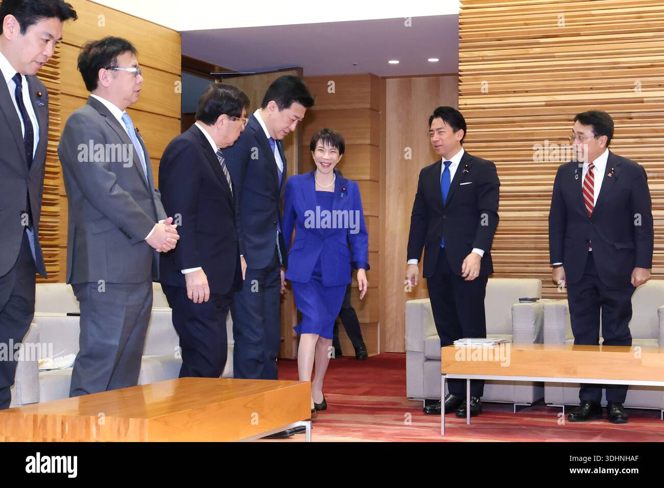 Japanese Prime Minister Sanae Takaichi (C) attends a cabinet meeting at ...