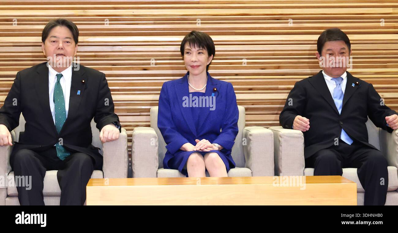 Japanese Prime Minister Sanae Takaichi (C) attends a cabinet meeting at ...