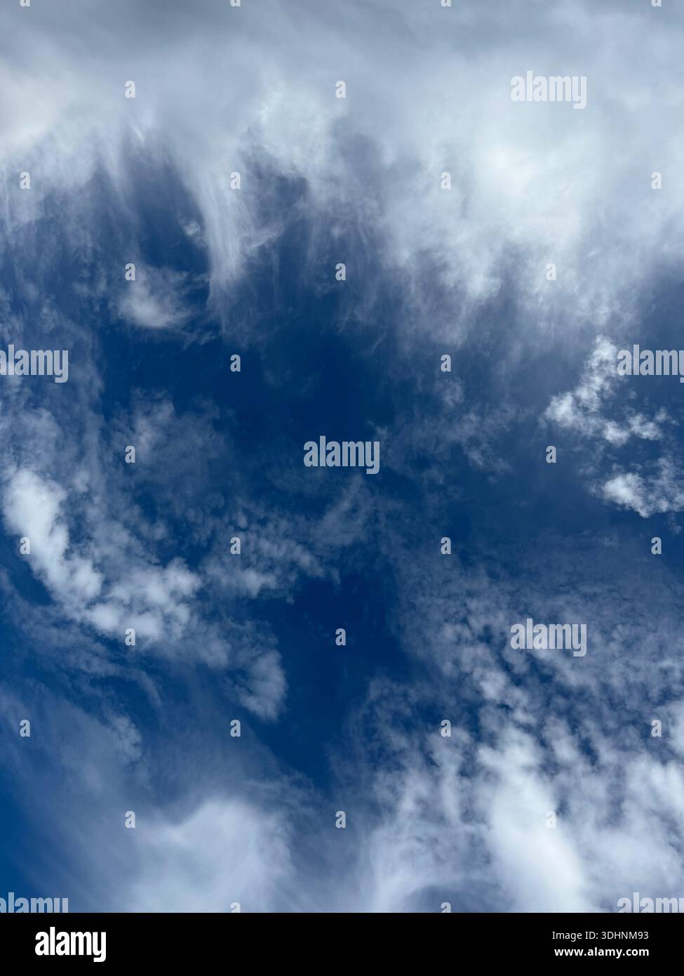 Fluffy clouds in th blue sky Stock Photo