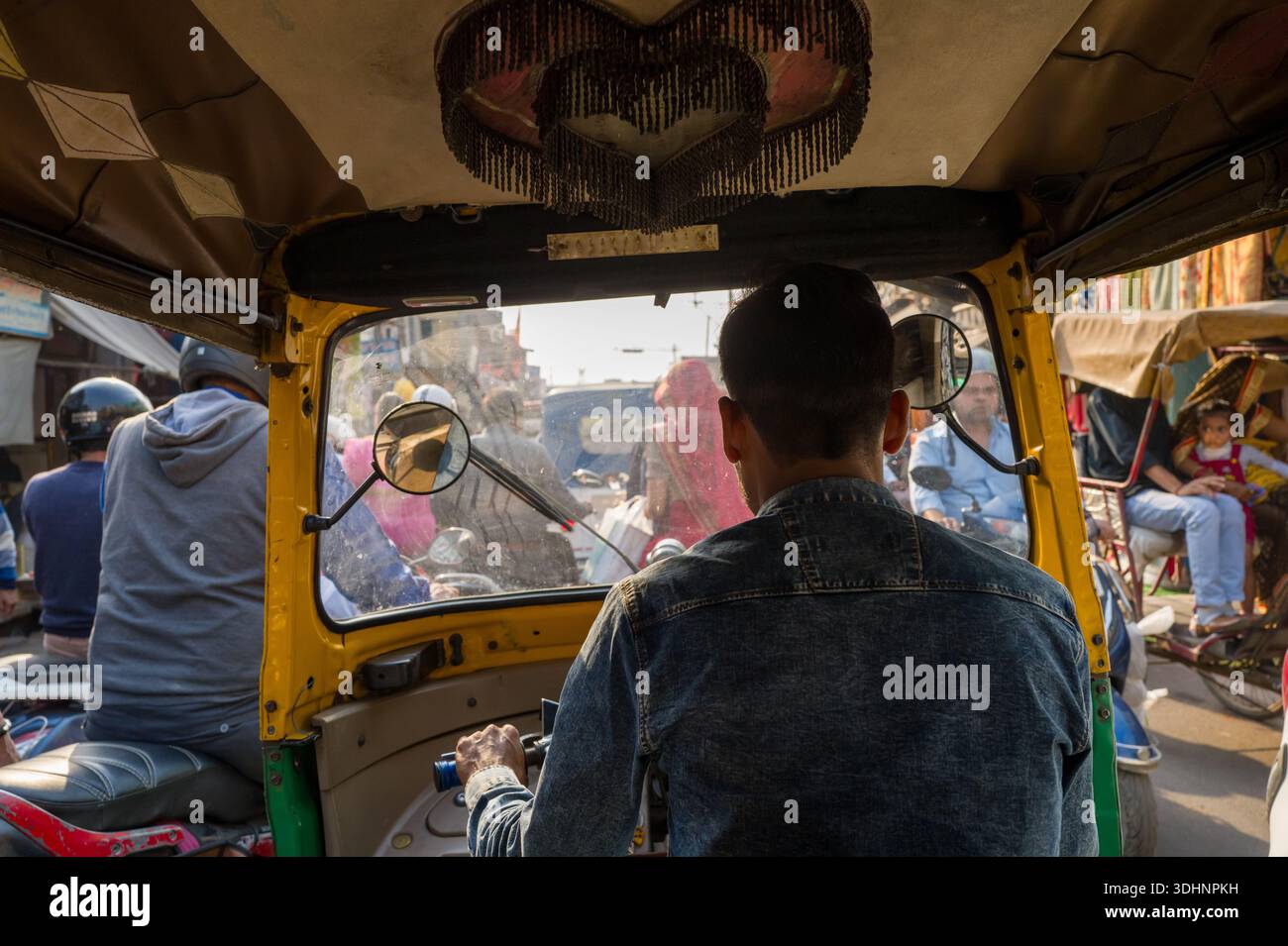 Agra, India - March 12, 2024: The image shows the back of an auto ...
