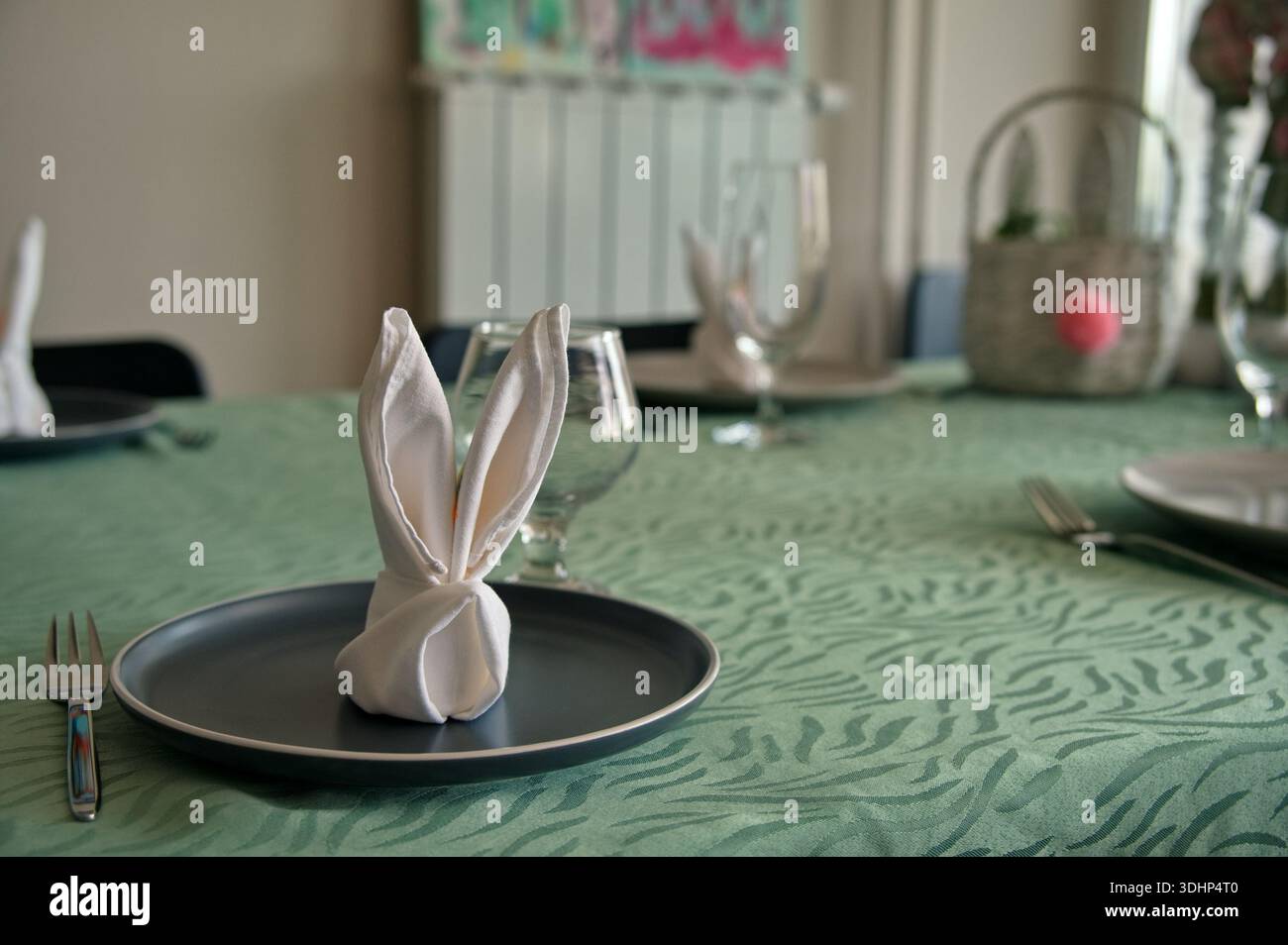 Decorated table served for Easter dinner Stock Photo