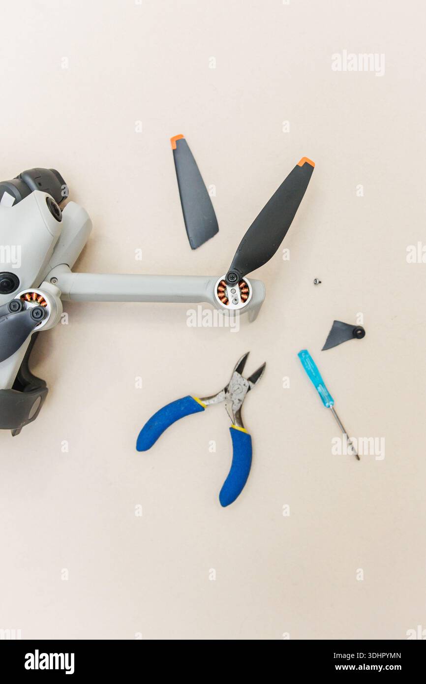 Drone maintenance repairing broken propeller with tools Stock Photo - Alamy