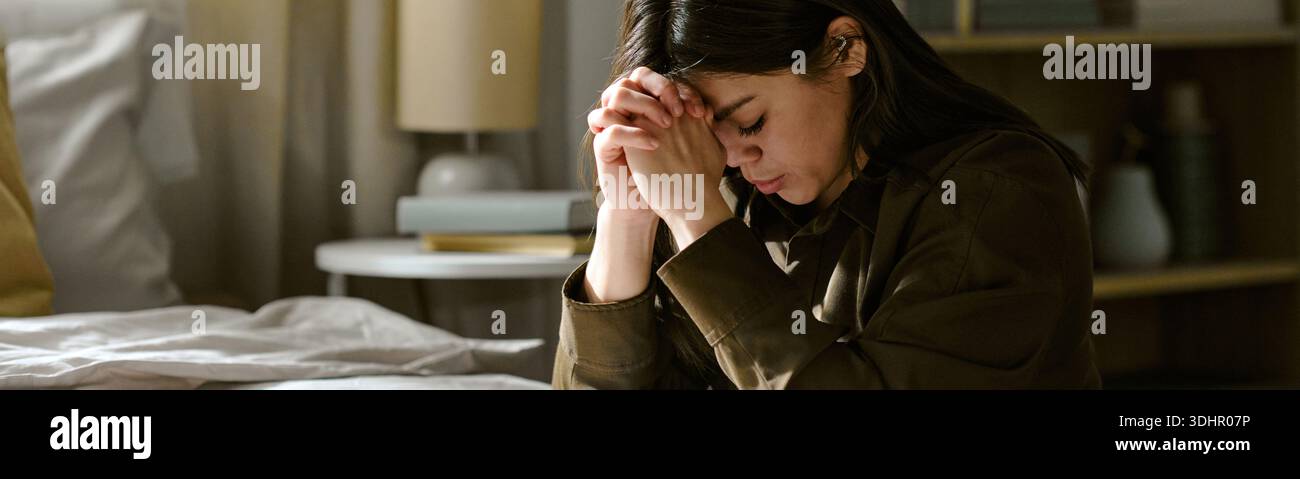 Woman in deep prayer head hi-res stock photography and images - Alamy