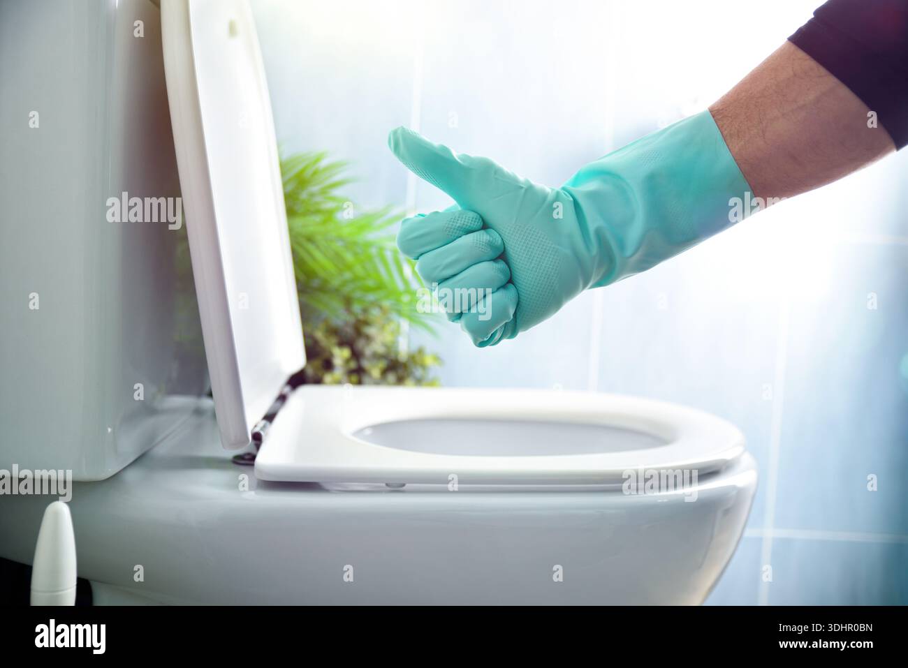 Hand with blue rubber glove scrubbing with ok gesture and background ...