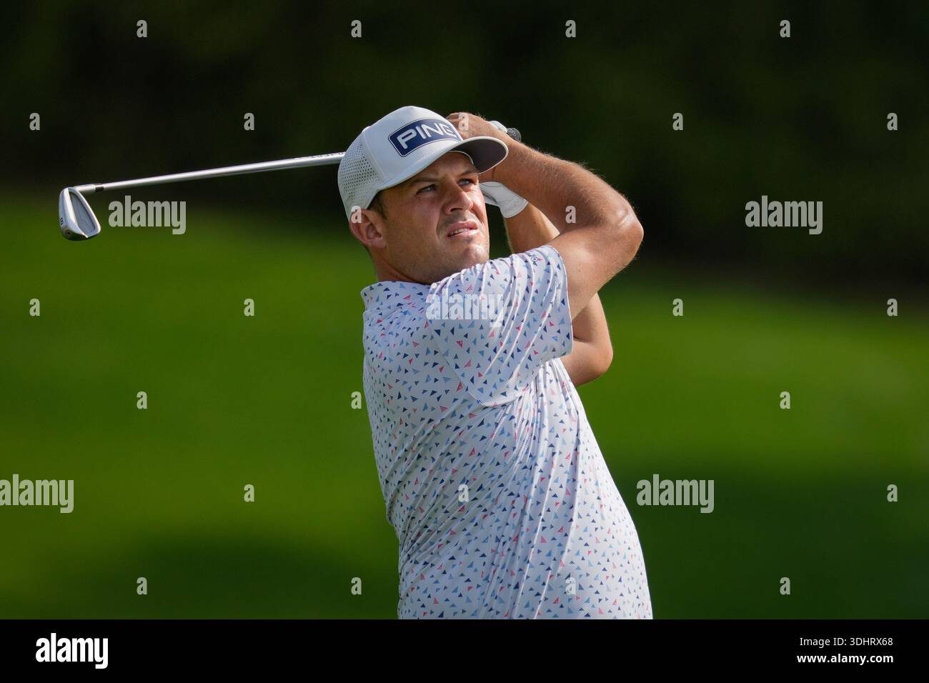 JC Ritchie of South Africa plays his second shot on the 9th hole during ...