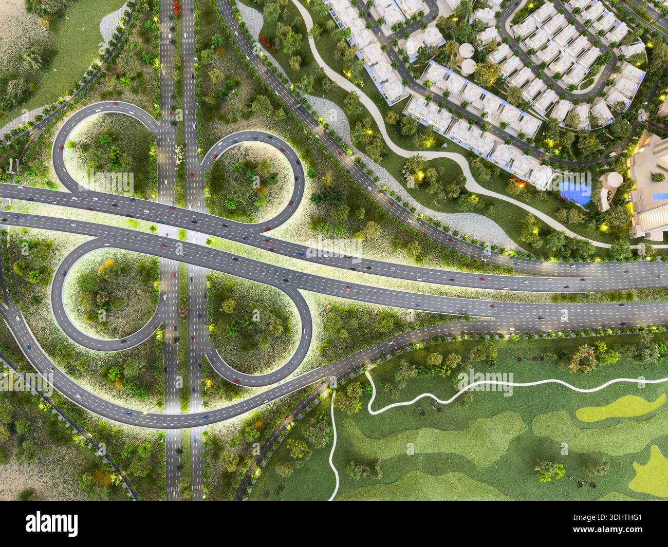 Aerial view of modern highway interchange with green landscaping and ...
