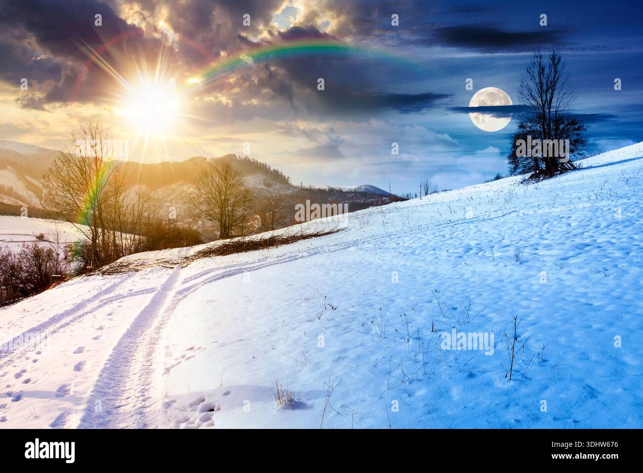 winter solstice landscape with snow covered forested hills. day and night time change concept. mountains in cold weather under sky with sun and moon. Stock Photo