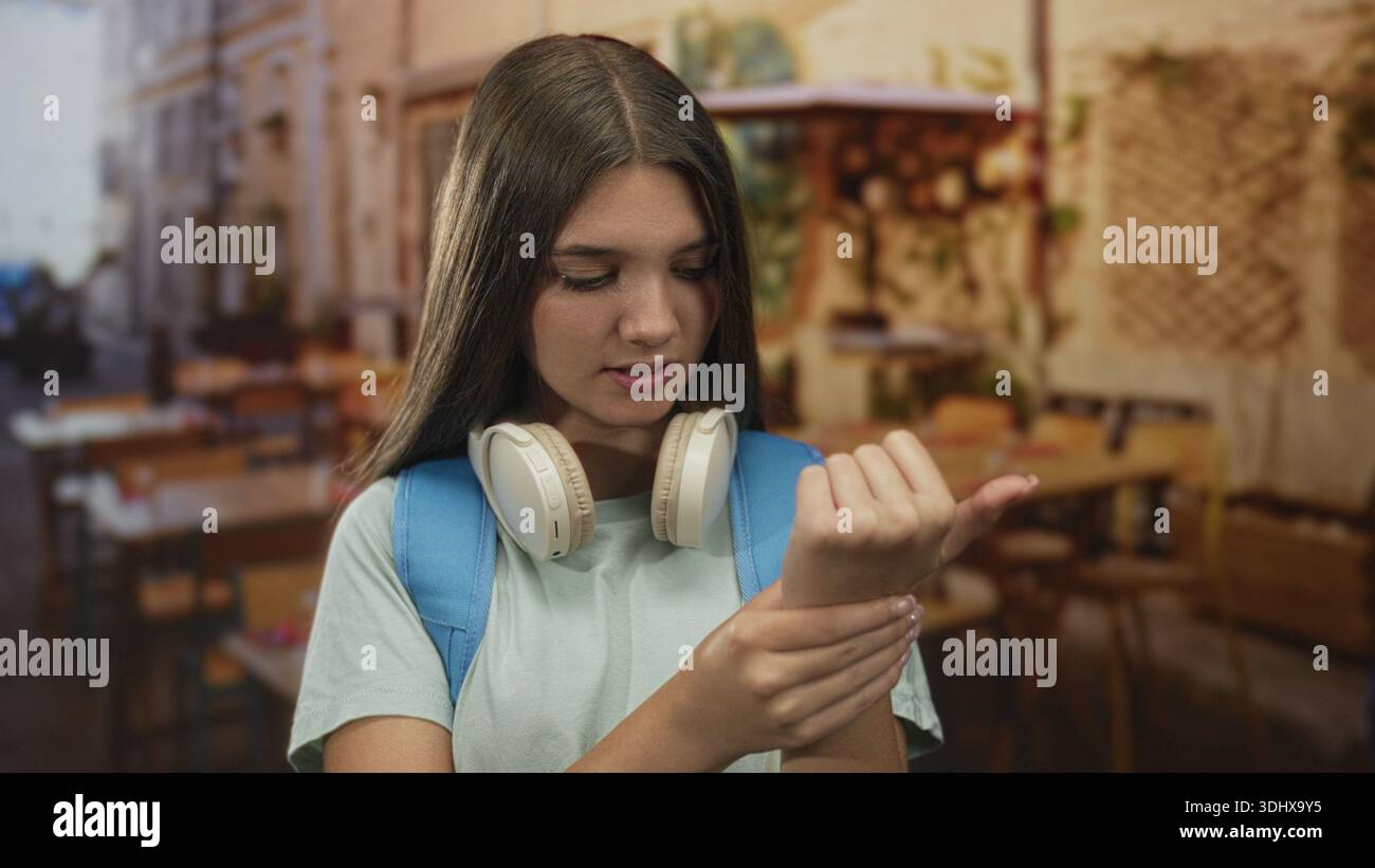 Teen girl touching neck hi-res stock photography and images - Alamy