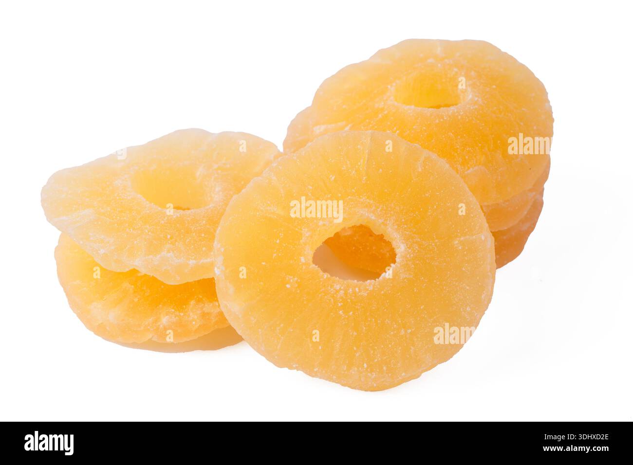 Dried pineapple slices on a white background. Stock Photo