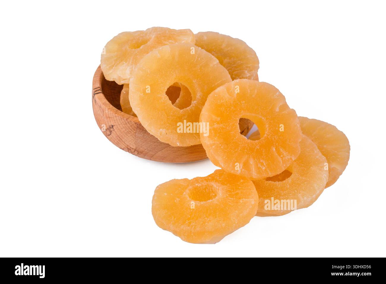 Dried pineapple slices on a white background. Stock Photo