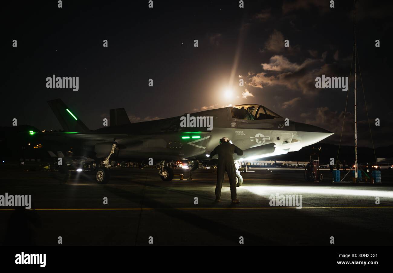 A Marine Corps pilot captain guides in a F-35B Lightning II following ...