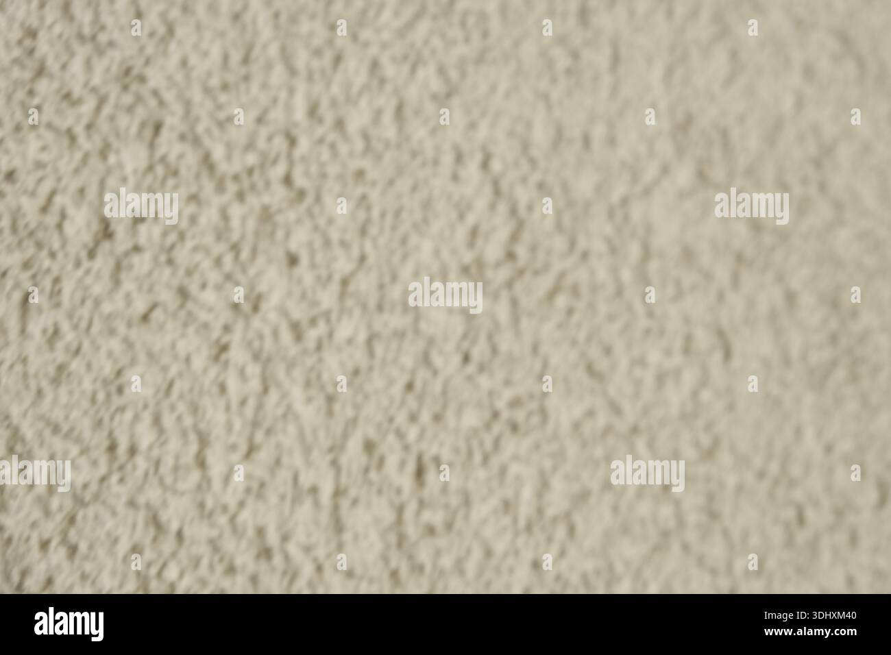 Beige Coarse Plaster Wall Blurred Background Texture. Stock Photo