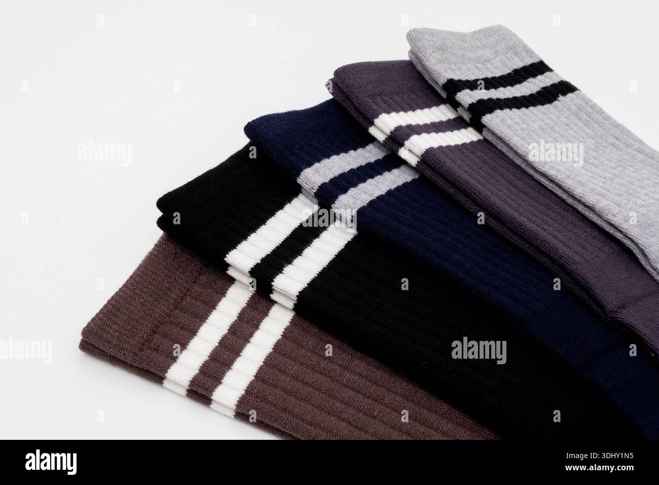 Set of colorful striped socks in various shades and patterns Stock Photo