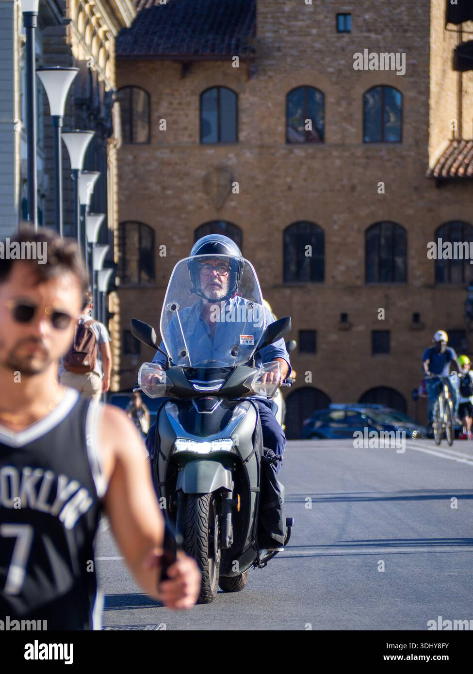 Scooter rider city backdrop hi-res stock photography and images - Alamy