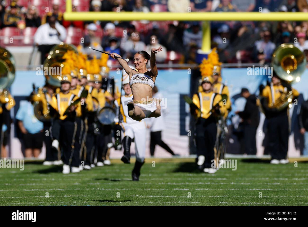 TAMPA, FL - DECEMBER 31: Iowa Hawkeyes marching band takes the field ...