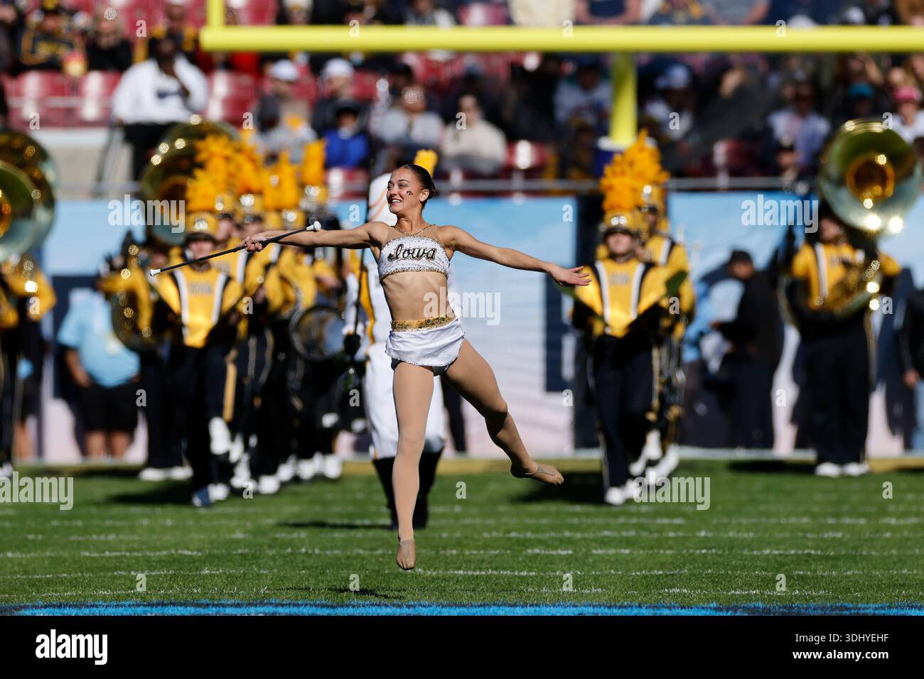 TAMPA, FL - DECEMBER 31: Iowa Hawkeyes marching band takes the field ...