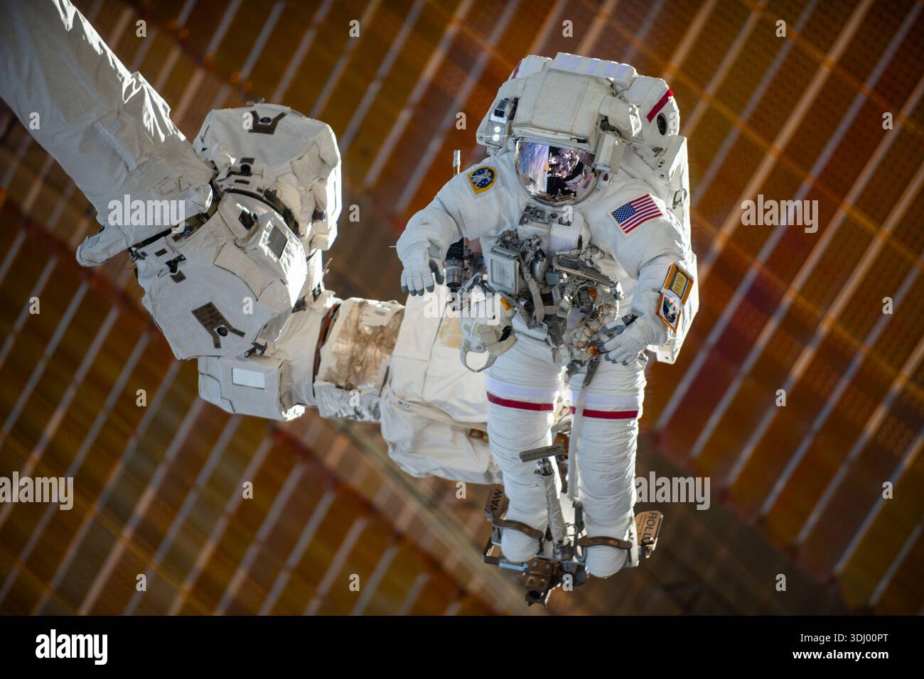 NASA astronaut and Expedition 72 Commander Suni Williams is attached to the Canadarm2 robotic arm's latching end effector while being manoeuvred to her worksite 264 miles above the South Pacific Ocean. Williams removed and stowed a radio frequency group antenna assembly during the five-hour and 26-minute spacewalk outside the International Space Station. A photograph taken from the International Space Station on 30 January 2025 An optimised version of an original ISS image: Credit: Roscosmos. EDITORIAL USE ONLY Stock Photo