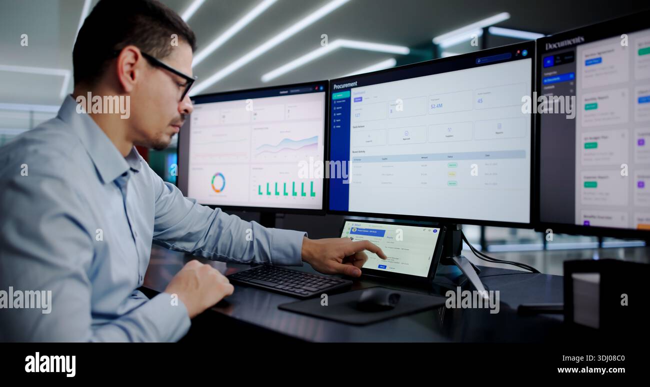 Busy Office Worker Using Desktop Computer For Business Communication Tasks. Stock Photo
