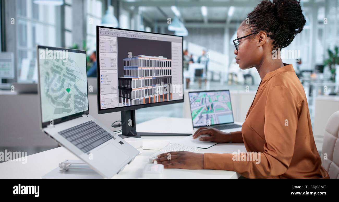 Virtual Construction Site: African American Woman Using 3D BIM Model Stock Photo
