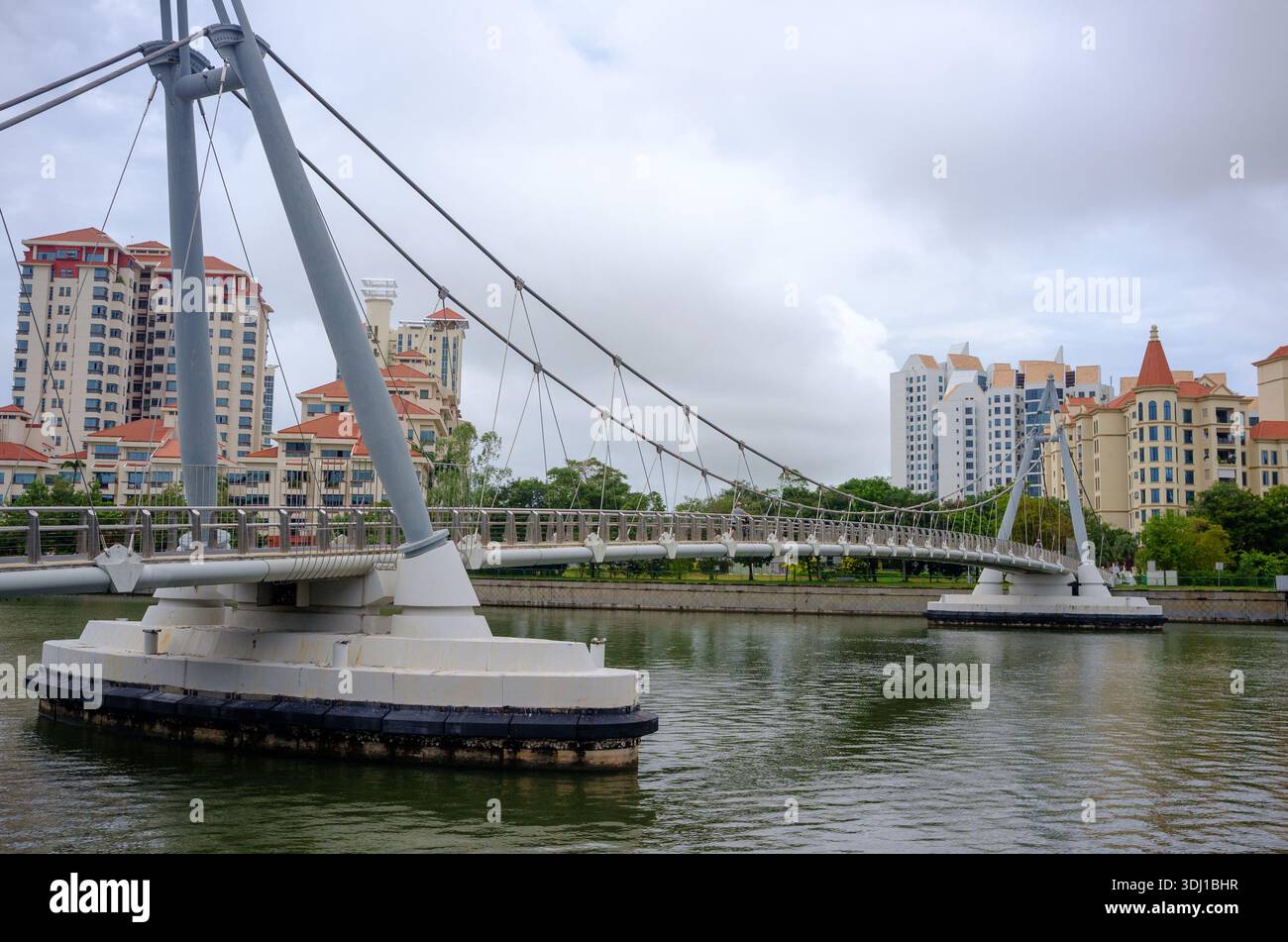Tanjong Rhu area seen from across Gaylang river, sports complex side showing river and Tanjong Rhu footbridge and condominiums Stock Photo