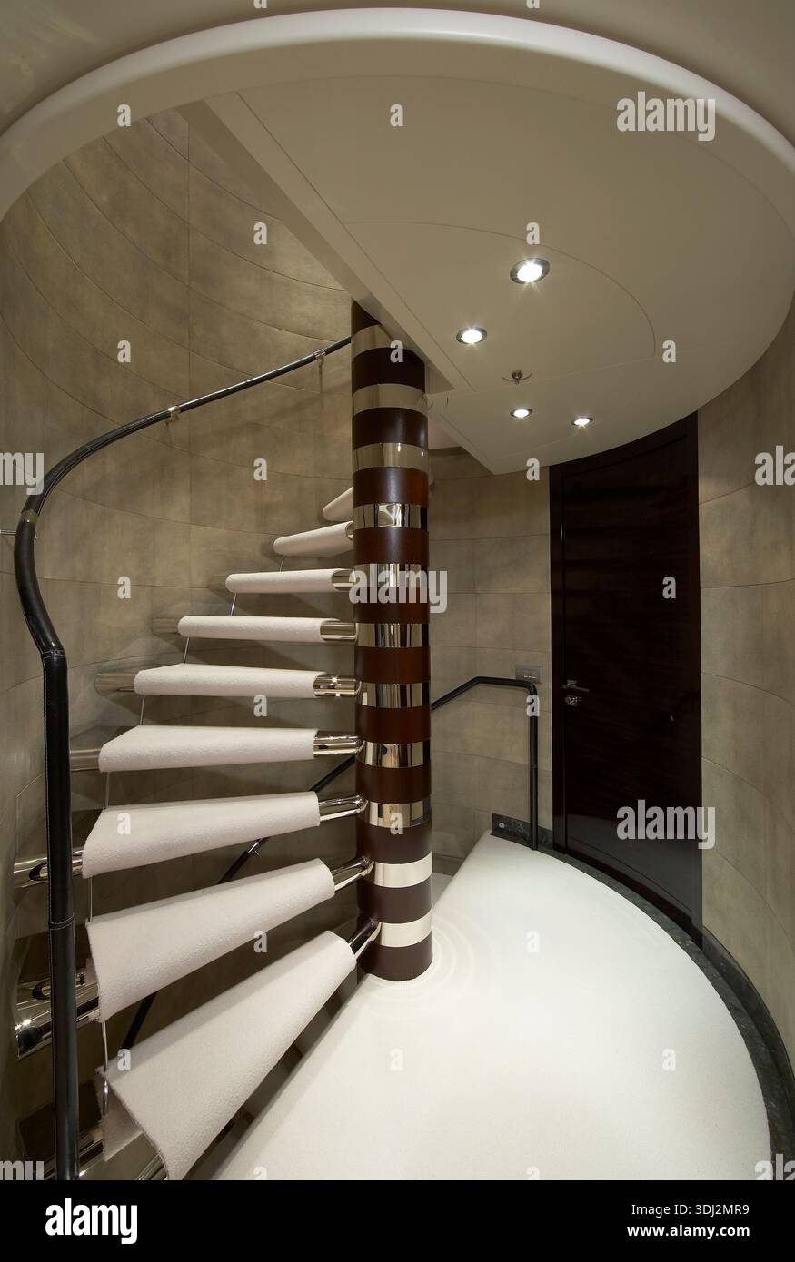 Modern Spiral Staircase Inside Circular Atrium With White Carpets ...