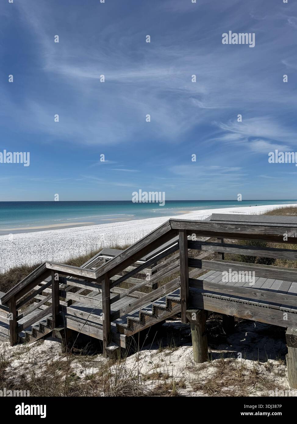 Walkway in Miramar Beach Florida with white sand and view of Gulf of Mexico water - Smartphone Captured Stock Image