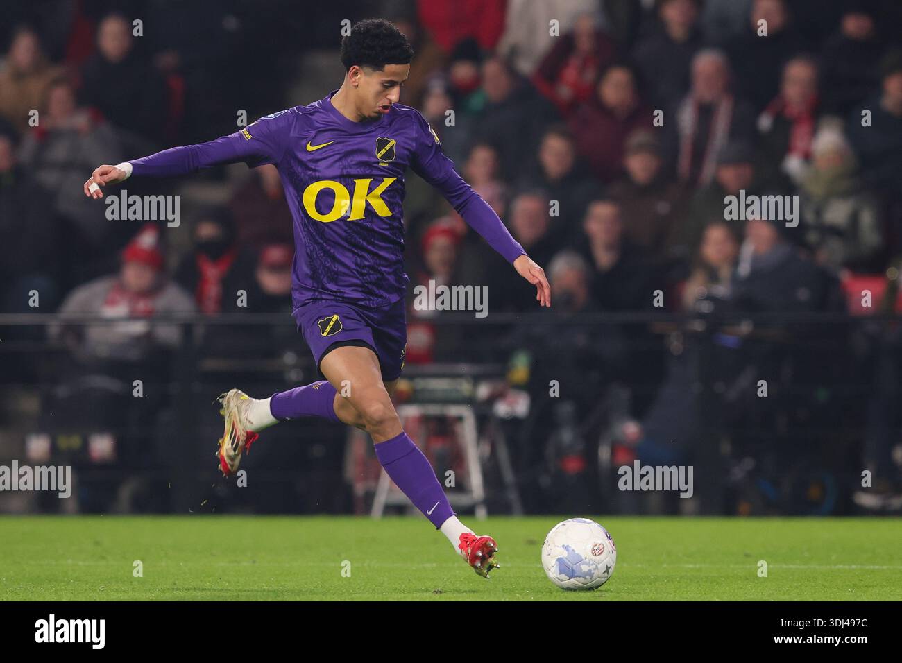 Eindhoven, Netherlands. 24th Jan, 2026. EINDHOVEN, NETHERLANDS - JANUARY 24: Charles-Andreas Brym of NAC Breda shoots the ball during the Dutch Vriendenloterij Eredivisie match between PSV and NAC Breda at Philips Stadion Eindhoven, Netherlands. 24th Jan, 2026. EINDHOVEN, NETHERLANDS - JANUARY 24: Charles-Andreas Brym of NAC Breda shoots the ball during the Dutch Vriendenloterij Eredivisie match between PSV and NAC Breda at Philips Stadion