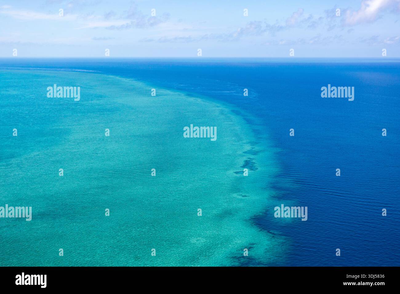 Blue ocean clouds in clear hi-res stock photography and images - Alamy
